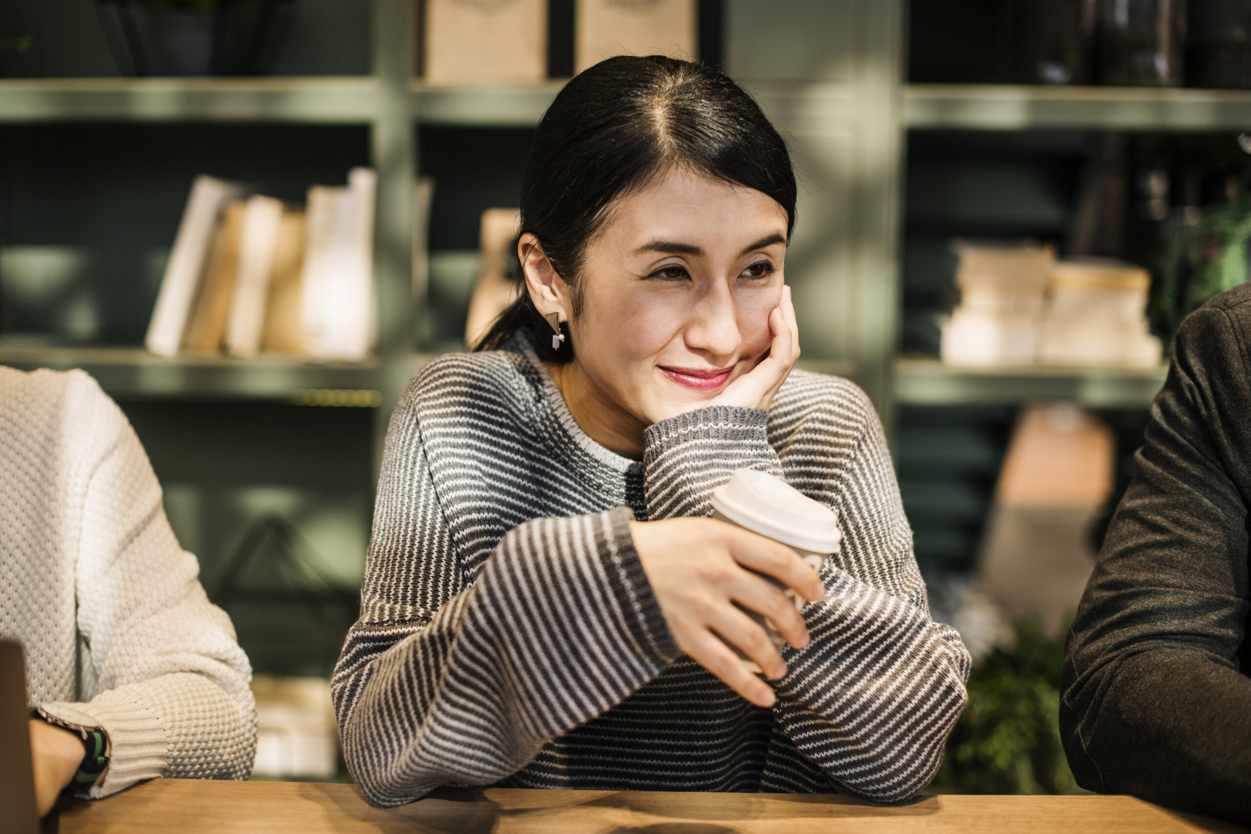 Japanese woman having a coffee